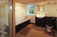 Bathroom with bath and large separate shower